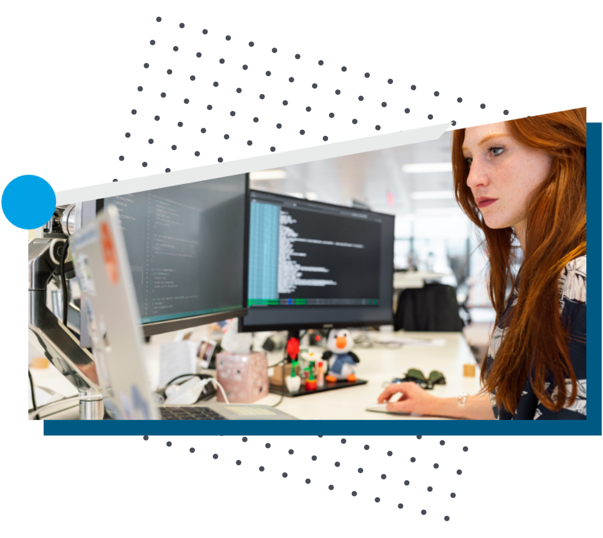 Woman working on code at her desk.